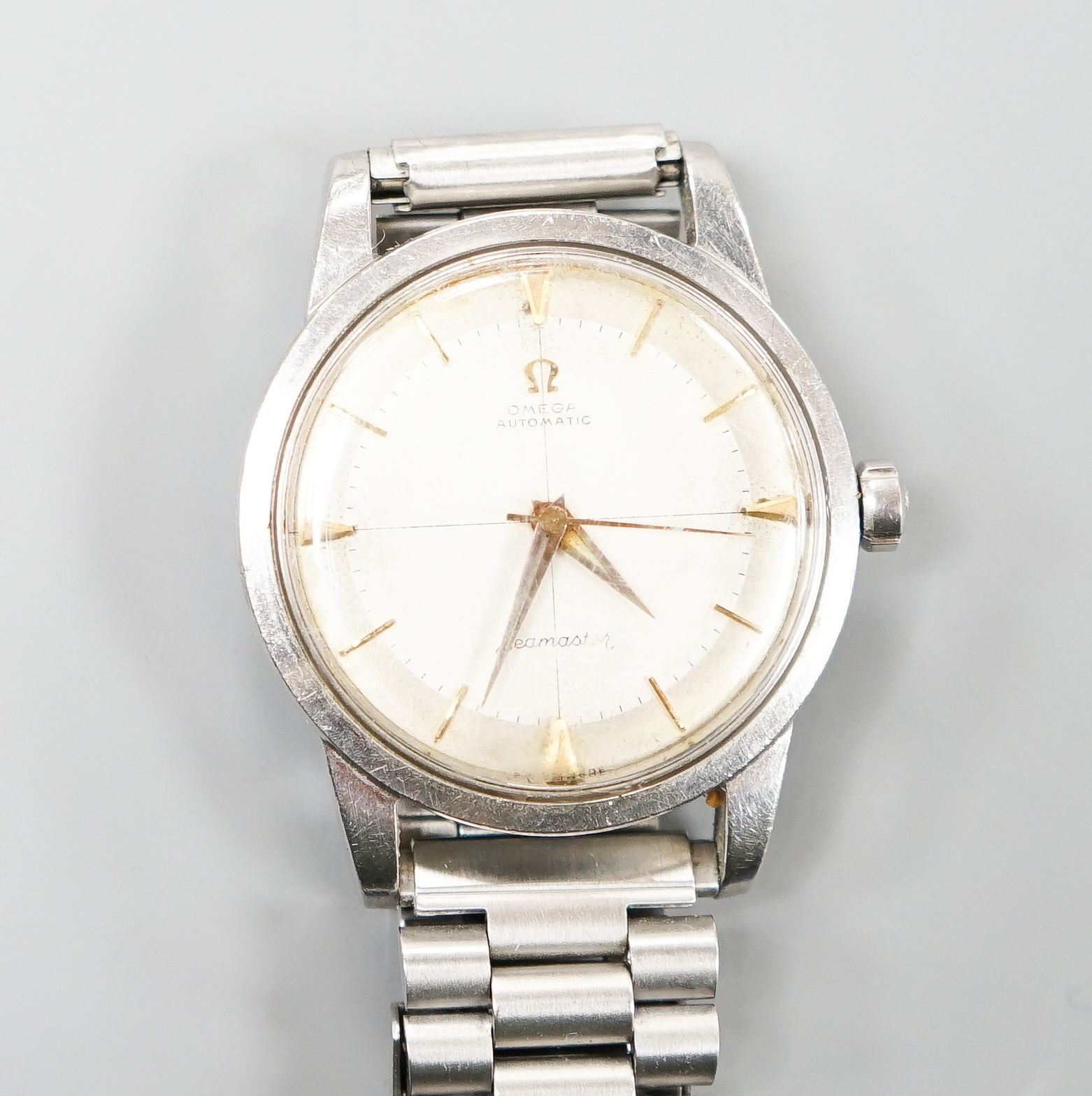 A gentleman's late 1950's stainless steel Omega Seamaster automatic wrist watch, on associated steel bracelet, movement c.501, no box or papers, cased diameter 36mm.